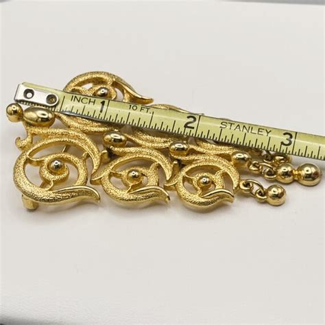 Vintage Lisner Gold Tone Articulated Brooch Pin La Gem