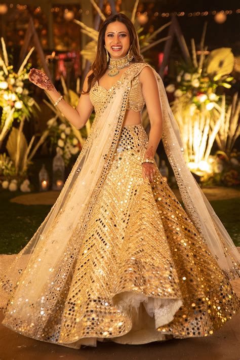 Buy Gold Net Embroidered Gota Scoop Neck Mirror Bridal Lehenga Set For