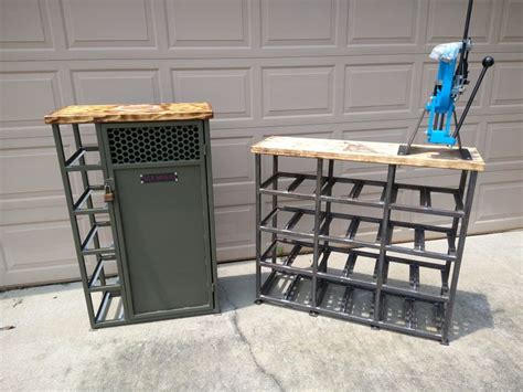 two metal and wood crates sitting next to each other in front of a garage door