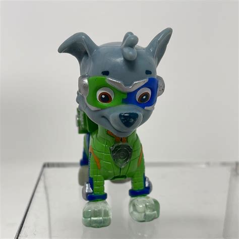 Paw Patrol Mighty Pups Light Up Badge And Feet Rocky Figure Shophobbymall