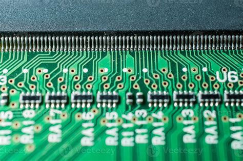 Closeup Of Leg Chip And Transistor Electronic Board 1243054 Stock Photo