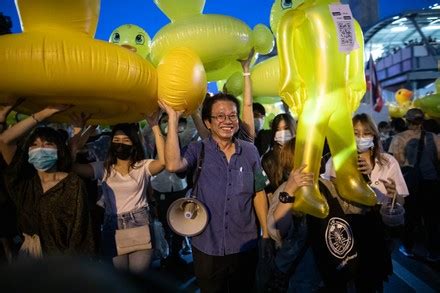 Seller Holds Seevral Yellow Ducks Balloons Editorial Stock Photo