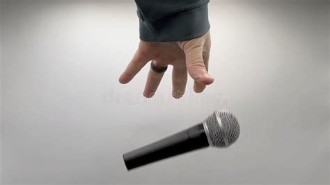 Drop the Mic on Sequence - Male Hand Black Mic Stock Image - Image of basic, concept: 272681385