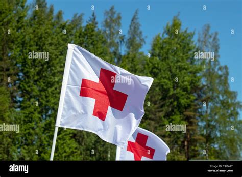 Red cross flags Stock Photo - Alamy