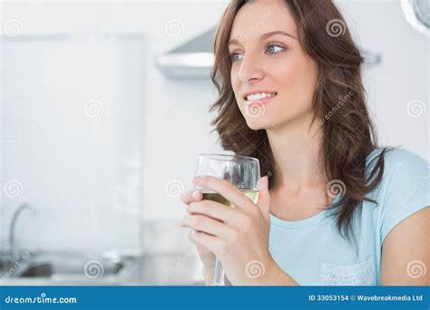 Radiant Brunette Drinking White Wine Stock Photo Image Of Brunette Apartment 33053154