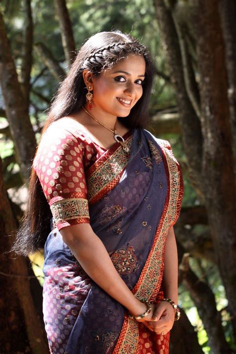 Kavya Madhavan Hot Spicy In Saree Photos Cinindya