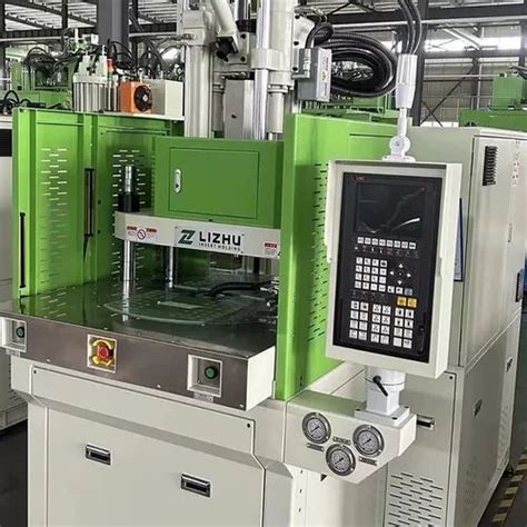 Rotary Table Vertical Injection Moulding Machine At Piece