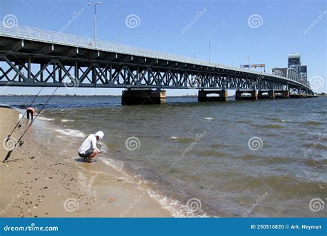 Marine Parkway Bridge Whiteclad Fisherman Fly Fishing On Brooklyn Side