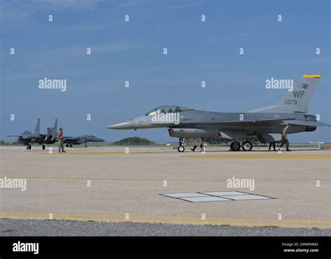 An 80th Fighter Squadron F 16 Fighting Falcon Sits On The Flightline As