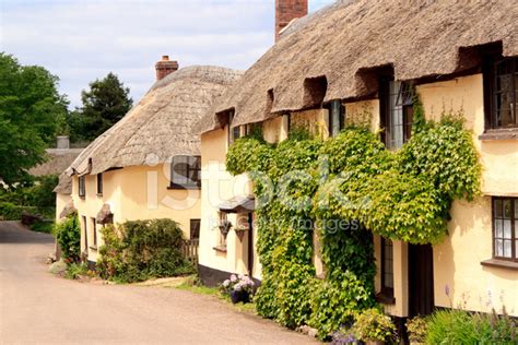 Traditional English Village Thatched Cottages Stock Photos