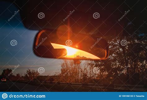 Rearview Close Up Of A Woman And Her Hairdresser Examining Hair Dye