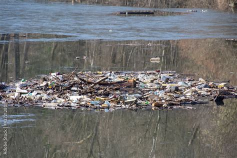 Garbage floating in the water - land water pollution Stock Photo ...