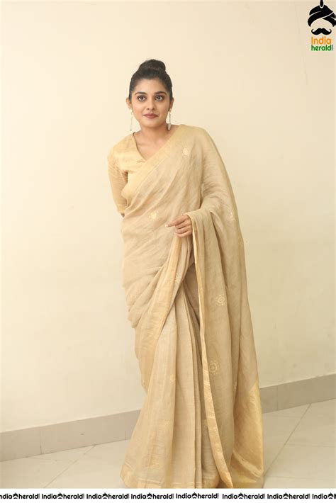Nivetha Thomas Latest Hot Stills In Saree Set