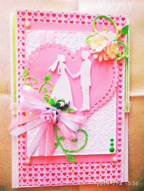 A Wedding Card Made With Pink Paper And White Cardstocks Decorated