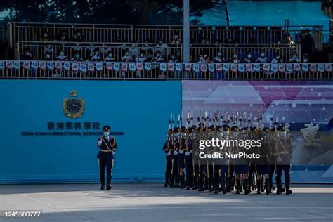 Officers From The Hong Kong Correctional Services Department Marching