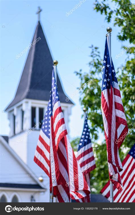 Us Flags On Ploes Outside Of Church Stock Photo By ©dprahl 155202178