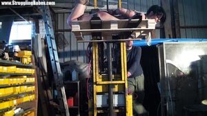 Naked Brunette Gal Gets Gagballed And Bound Facedown On XXX Dessert