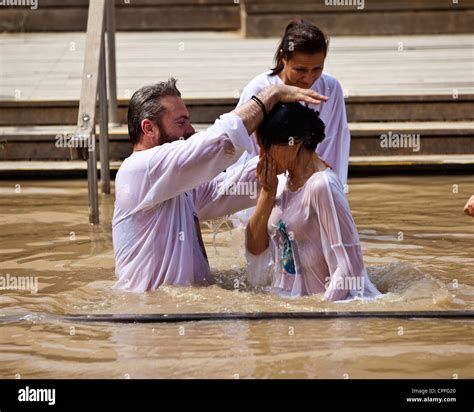 Russian Orthodox Christian Baptism On The Israeli Bank Of The River Jordan From Bethany Beyond