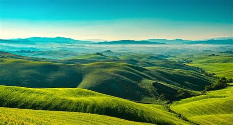 Premium Photo Volterra Foggy Panorama Rolling Hills And Green Fields