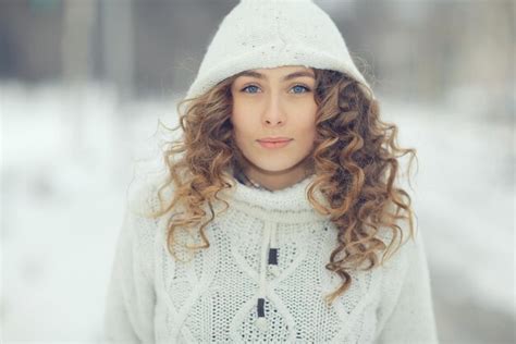 Premium Photo Portrait Of A Beautiful Blonde Winter Outside