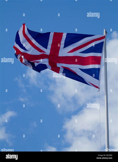 Union Jack flying from a flagpole Stock Photo - Alamy