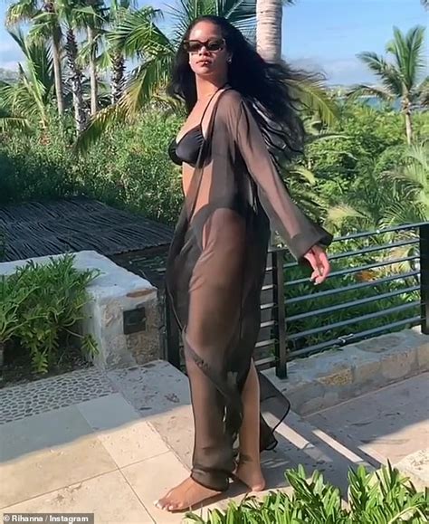Rihanna Showcases Her Fantastic Bikini Body As She Struts Her Stuff In Sexy Black Bathing Suit