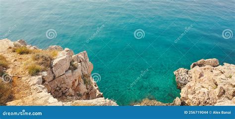 Ocean Water With Cliff From Above Rocky Beach Stock Photo Image Of