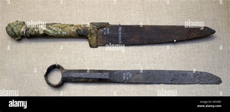 Iron knife and Iron knife with a bronze handle from the 1st Century ...