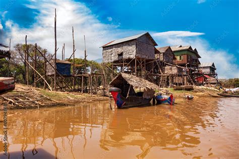 Kampong Phluk floating fishing village, boats and houses on stilts on ...