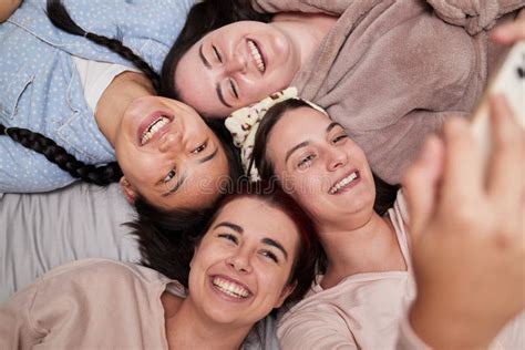 Selfie Happy And Friends Lying In A Circle While At A Fun Friendship