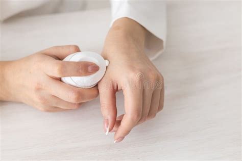 Female Hands With Cream Woman Applies Cream On Her Hands Stock Image