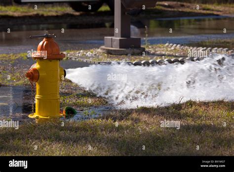 Water Gushing Out Of An Open Fire Hydrant Stock Photo Alamy