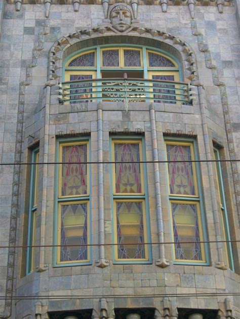 an old building with many windows on the side