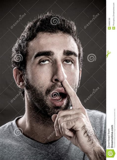 Homme Avec Un Doigt Dans Son Nez Photo Stock Image Du Occasionnel