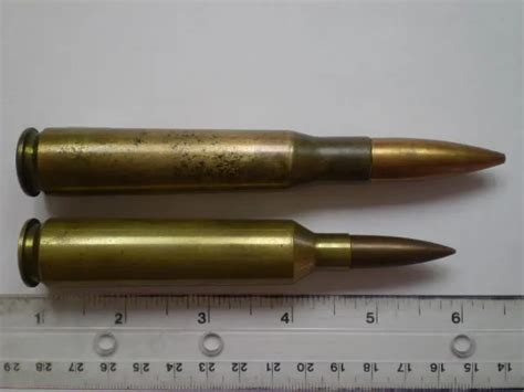 338 Lapua Vs 50 Bmg Ballistics