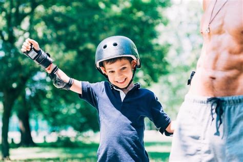 Premium Photo | Little boy roller skating in park