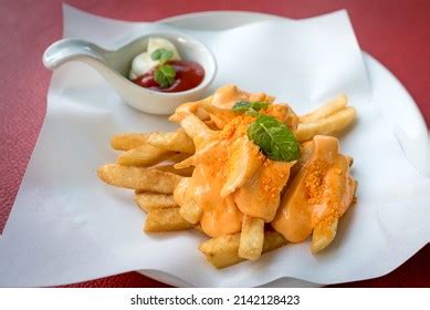 French Fries Cheese Sauce On Top Stock Photo 2142128423 | Shutterstock