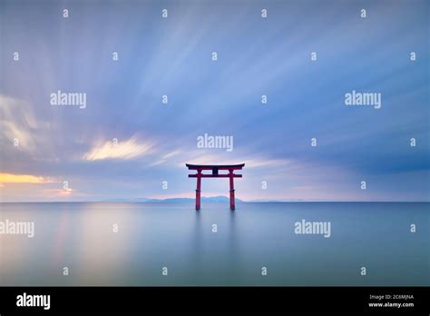 Long Exposure Shot Of Shirahige Shrine Torii Gate At Sunrise Lake Biwa