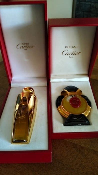 Cartier - perfume bottle Cartier (2) - glass, plastic - Catawiki