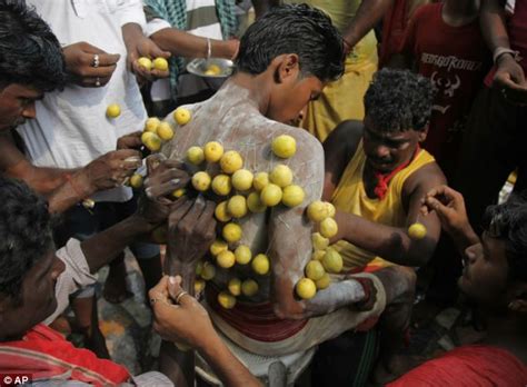 Stunning Photos Show How Hindu Devotees Pierce Themselves In Painful