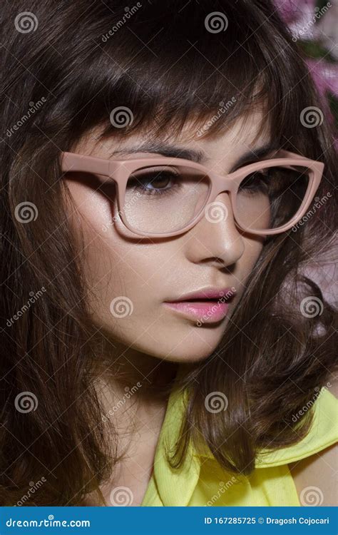 Closeup Beauty Portrait Of A Girl With Pink Nude Eyeglasses Perfect Skin And Makeup Short