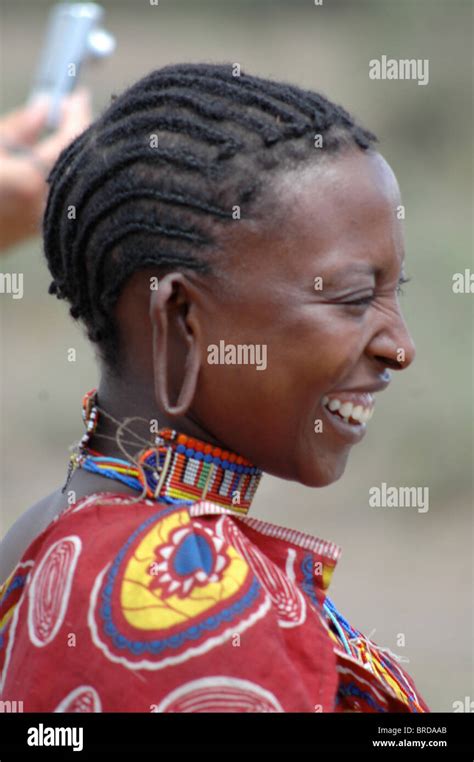 Masai woman in Kenya in profile with long ear lobe Stock Photo - Alamy