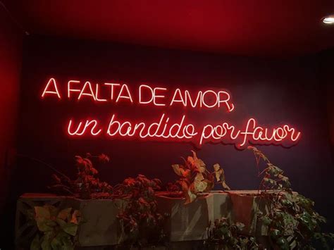 A Red Neon Sign That Reads La Fala De Amr Un Badia Por Flavor