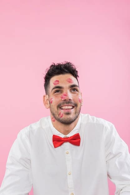 Free Photo Handsome Man With Lipstick Kiss Marks On Face