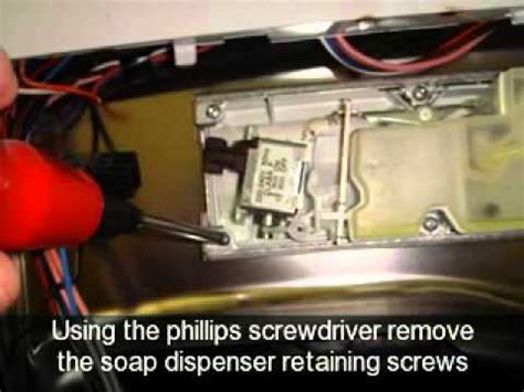 How To Replace A Soap And Rinse Aid Dispenser On A Dishwasher Hotpoint