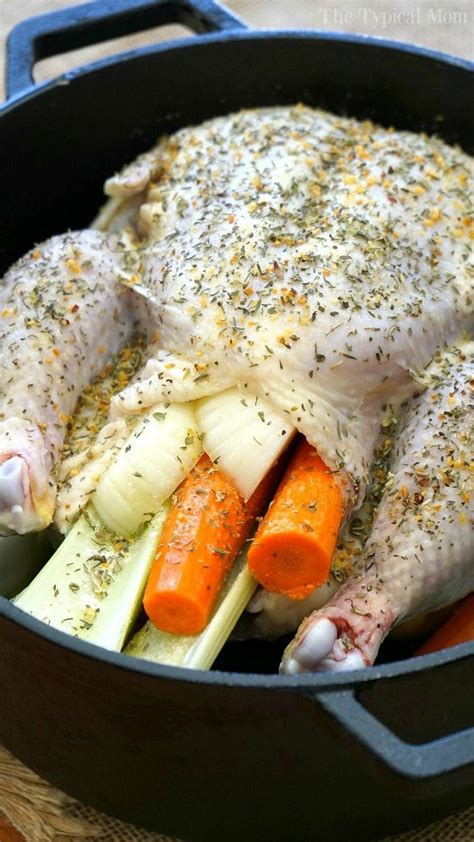 Stuffed Dutch Oven Whole Chicken And Potatoes And Vegetables