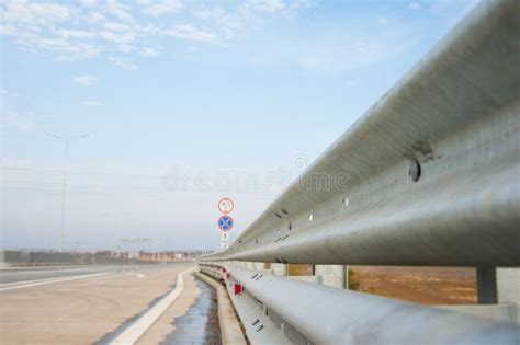 Road with guard rail stock image. Image of turn, railing - 128280197