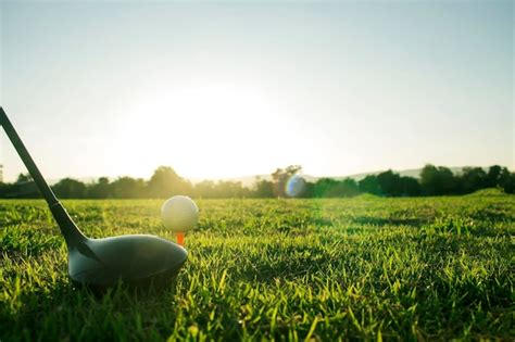 Premium Photo Golf Clubs And Golf Balls On A Green Lawn In A