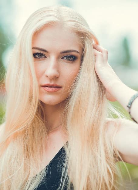 Premium Photo A Beautiful Blonde Beautiful SmilesPortrait Of An European Blonde Girl