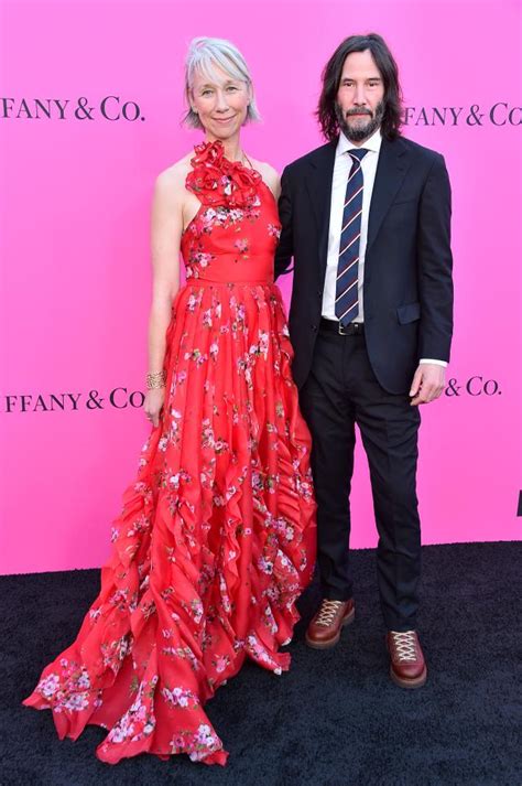 Keanu Reeves Kisses Alexandra Grant With Eyes Open On Red Carpet